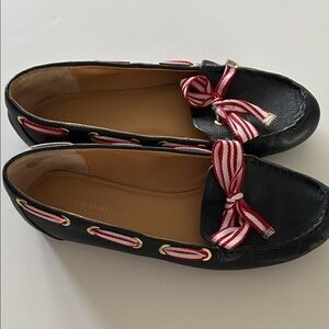 Blue loafers with ribbon eyelet stitching